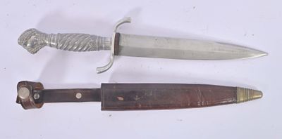 two knives that are laying next to each other on a table