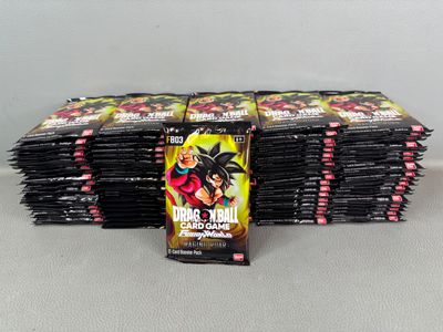 a pile of dragon ball trading cards sitting on top of each other