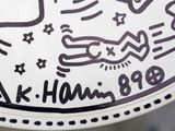 a white plate with a drawing on it with writing on it