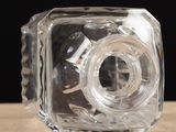a glass block with a camera inside of it on a table