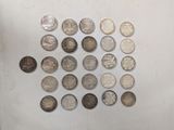 several different types of coins are arranged in a circle on a white surface