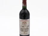 a bottle of wine that is sitting on a table
