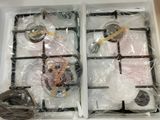 two boxes of food that are wrapped in plastic