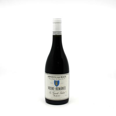 a bottle of wine that is sitting on a table