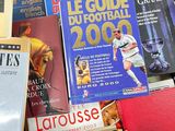 a lot of books that are on a table