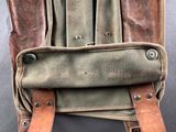 an image of a backpack with a leather strap