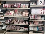 a lot of items on the shelves in the store