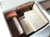 a box full of books sitting on a table