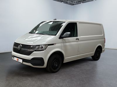 the white van is parked in a large room