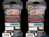 two packs of pokemon trading cards are shown on a black background