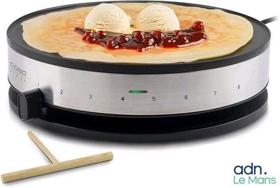 an image of a crepe maker with two scoops of ice cream on top
