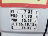 a sign on the back of a white car that says gas prices