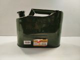 a green container with a black handle on a white table