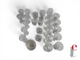 a pile of glass beads and a coin on a white surface