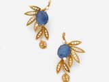 a pair of sapphire and diamond earrings