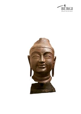 an image of a statue of a buddha head on a white background