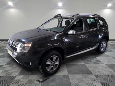 a picture of a black suv parked in a garage