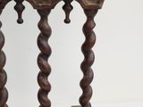 a wooden stand with a mirror on top of it
