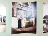 three pictures of a building on the wall of a building