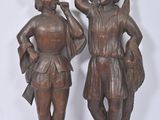 paire de figurines anciennes en bronze représentant un homme et une femme