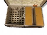 an open suitcase with a handle and two doors