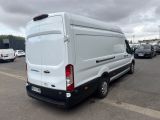 a white van that is parked in a parking lot