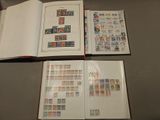 a book with stamps on it sitting on a table