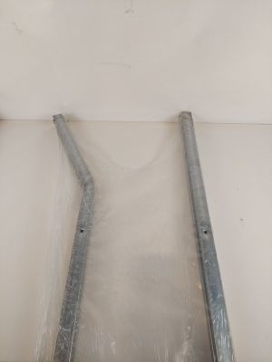 a metal ladder that is attached to a wall