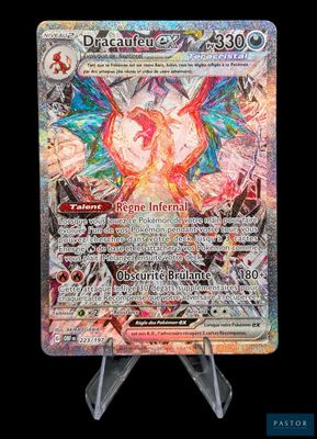 a close up of a pokemon card on a stand