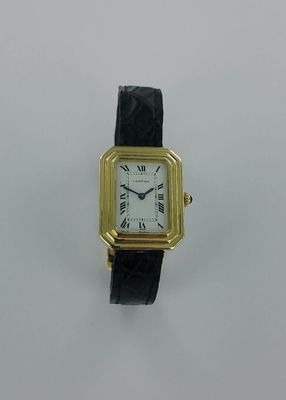 CARTIER, Cristallor. Montre or sur bracelet cuir, boucle or …
