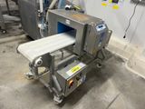 a conveyor belt with a conveyor belt attached to it