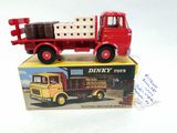 a toy truck that is sitting on top of a box