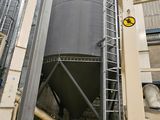 a large metal tank that is inside of a building