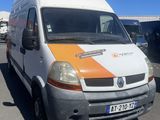 a white van with orange stripes parked in a parking lot