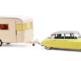 yellow toy car and trailer on white background with white background