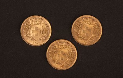 trois pièces d'or sur lesquelles figure un blason