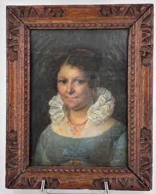 portrait of a woman in a blue dress with a white ruffled collar