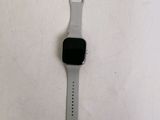 the apple watch is sitting on a table with a white surface