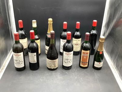 bottles of wine are lined up in a row on a counter