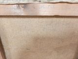 a piece of paper on top of a piece of wood
