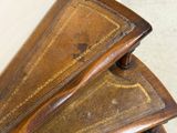 two pieces of furniture that are sitting on top of each other