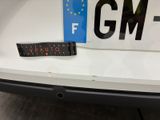a sticker on the back of a car that says gm