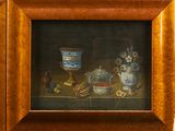 three framed pictures of cats on the wall