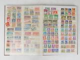 a book with stamps on the pages and a book with stamps on the pages