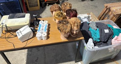 many different types of wigs on a table