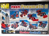 a box of legos with instructions on it on a white surface