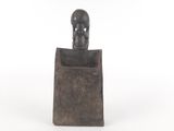 an image of a statue of a person in a box on a white background
