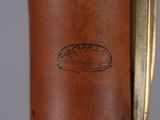 an image of a close up of a wooden object with writing on it
