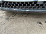 a close up of the front bumper of a car