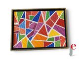 painting of a multicolored stained glass mosaic in a wooden frame